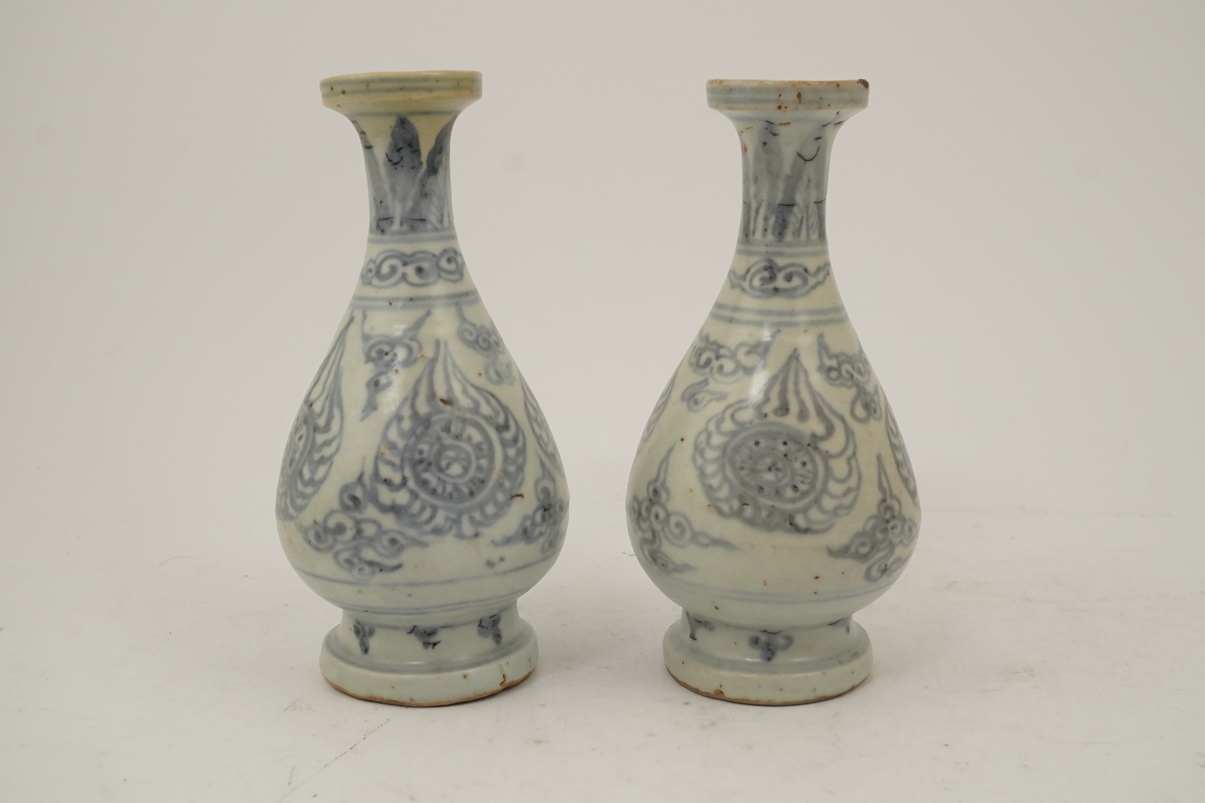 A pair of Chinese blue and white pear-shaped shipwreck vases, Ming dynasty, 15th century